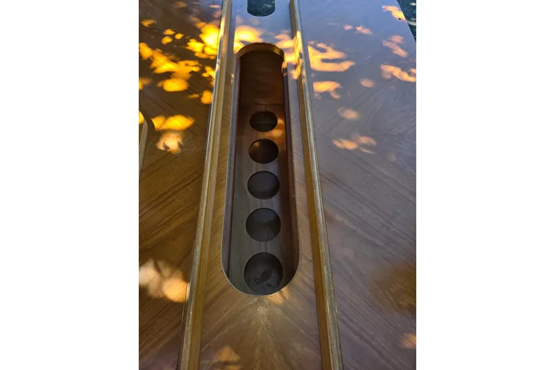 Slide: The Image of Wooden table with built-in cup holders on a 1991 Beneteau 35.5 S5 yacht. - 7