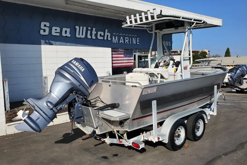 Slide: The Image of 2003 Pacific Boats 2025 V with Yamaha outboard at Sea Witch Marine dealership. - 3