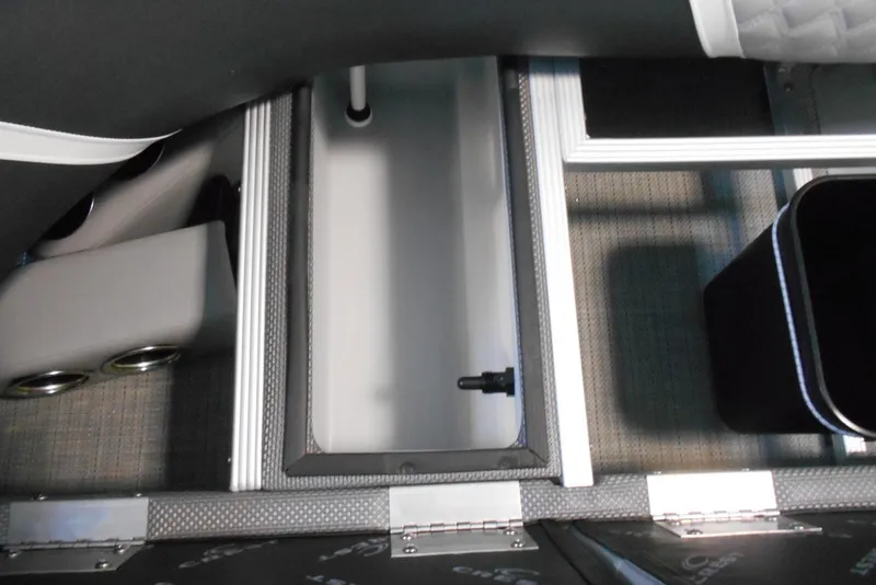 Slide: The Image of Interior storage compartment of 2025 Crest Classic Fish 220 boat. - 23