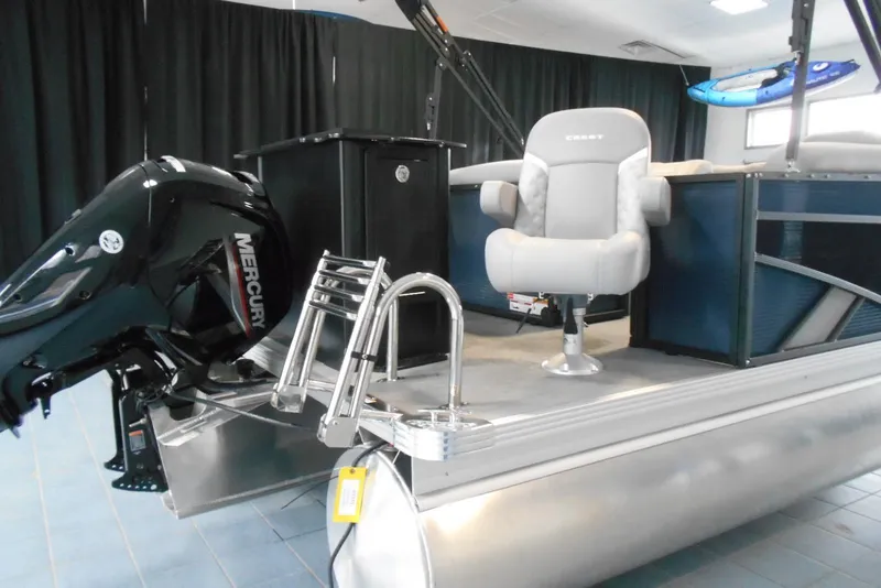 Slide: The Image of 2025 Crest Classic Fish 220 pontoon boat with Mercury engine and seating. - 6