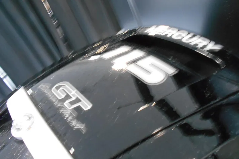 Slide: The Image of Close-up of a Mercury 115 GT engine on a 2025 Crest Classic Fish 220 boat. - 7