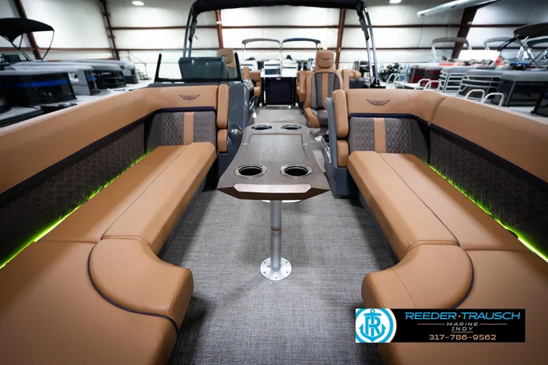 Slide: The Image of Luxurious interior of 2026 Bennington 22 MFB pontoon boat with tan seating and modern design. - 15