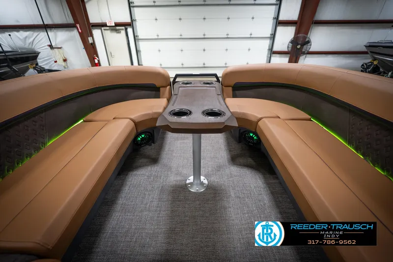 Slide: The Image of 2026 Bennington 22 MFB boat interior with modern dashboard and luxurious seating. - 20