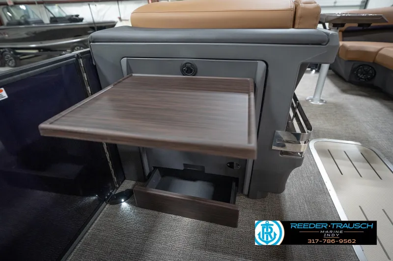 Slide: The Image of 2026 Bennington 22 MFB boat interior with storage compartment and seating. - 29