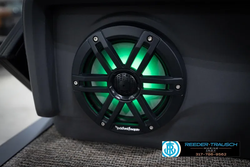 Slide: The Image of Rockford Fosgate speaker with green LED light on Bennington 22 MFB, 2026 model. - 39