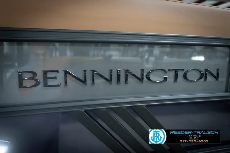 Slide: The Image of 2026 Bennington 22 MFB boat logo with Reeder-Trausch Marine contact details. - 56