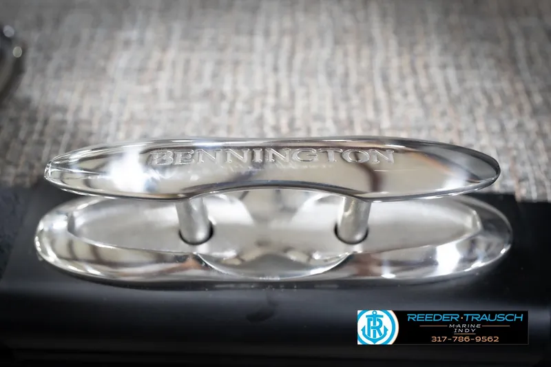 Slide: The Image of Chrome cleat on 2026 Bennington 22 MFB boat, featuring engraved brand name. - 60