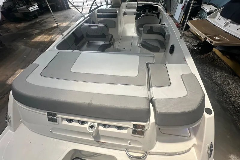 Slide: The Image of 2024 Bayliner VR6 Bowrider OB interior with spacious seating and modern design. - 10