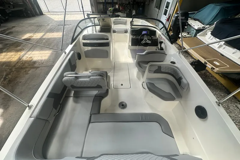 Slide: The Image of 2024 Bayliner VR6 Bowrider OB interior with spacious seating and modern design. - 11