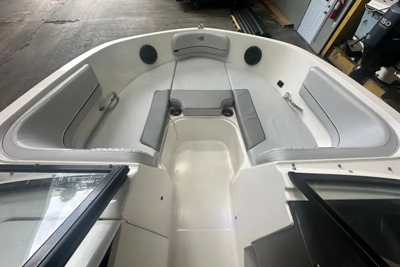 Slide: The Image of 2024 Bayliner VR6 Bowrider OB interior with spacious seating and modern design. - 18