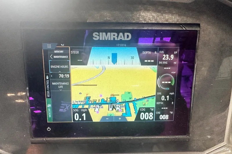 Slide: The Image of Simrad navigation display on 2024 Bayliner VR6 Bowrider OB showing engine and fuel data. - 21