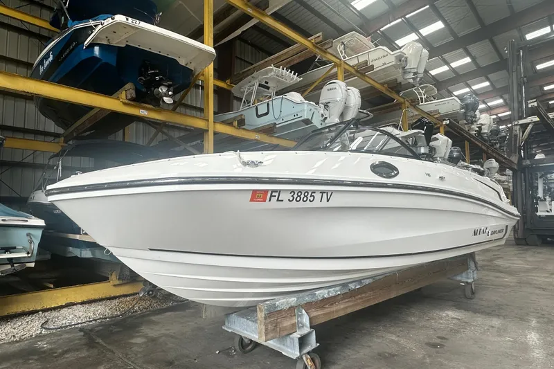 Slide: The Image of 2024 Bayliner VR6 Bowrider OB in storage, showcasing sleek design and modern features. - 6