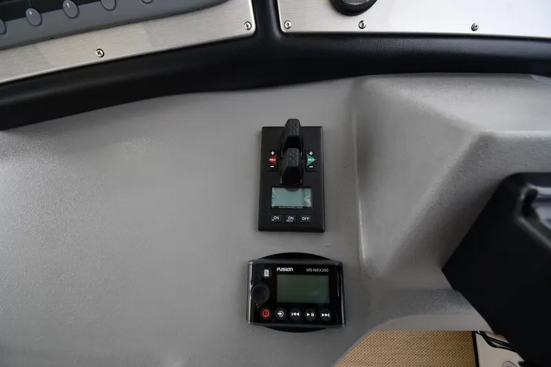 Slide: The Image of 2007 Cruisers Yachts 455 Express Motoryacht dashboard controls and display panel. - 15