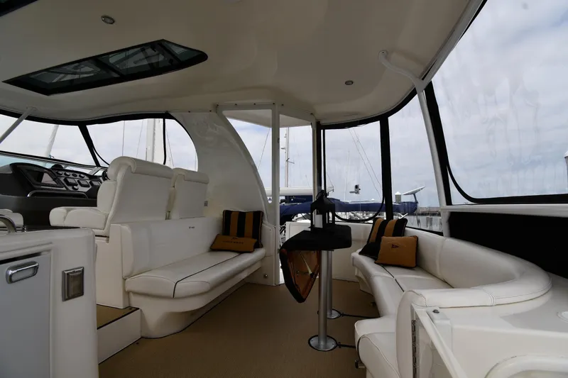 Slide: The Image of Luxurious interior of 2007 Cruisers Yachts 455 Express Motoryacht with plush seating. - 18