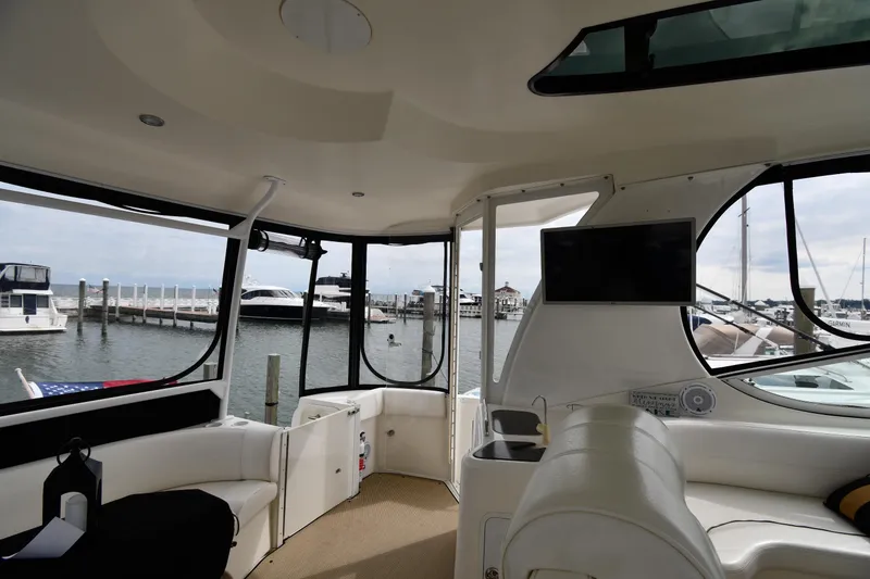 Slide: The Image of Interior view of 2007 Cruisers Yachts 455 Express Motoryacht at marina. - 20