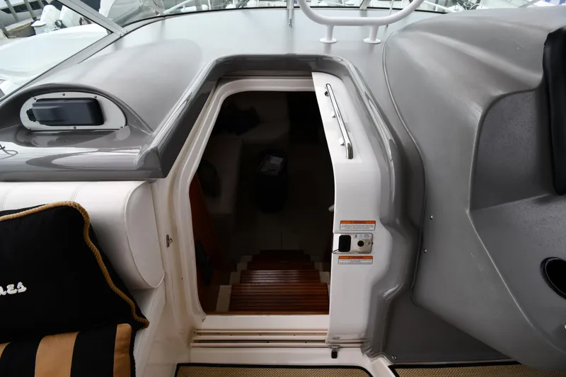 Slide: The Image of 2007 Cruisers Yachts 455 Express Motoryacht interior entrance with stairs and seating. - 28
