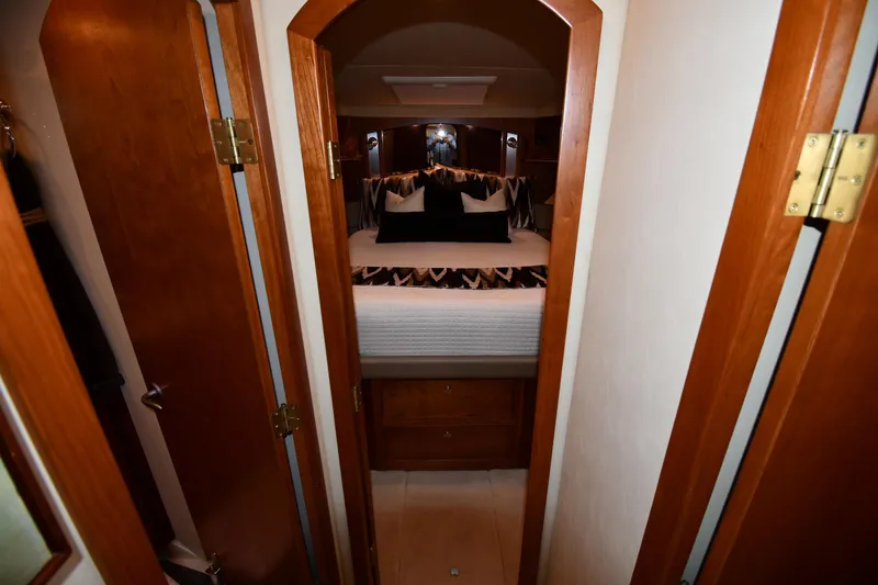 Slide: The Image of Luxurious bedroom interior of 2007 Cruisers Yachts 455 Express Motoryacht with elegant wood finishes. - 31