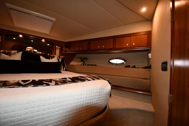 Slide: The Image of Luxurious interior of 2007 Cruisers Yachts 455 Express Motoryacht bedroom. - 33