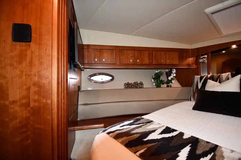 Slide: The Image of Luxurious interior of 2007 Cruisers Yachts 455 Express Motoryacht with elegant wood finish. - 34