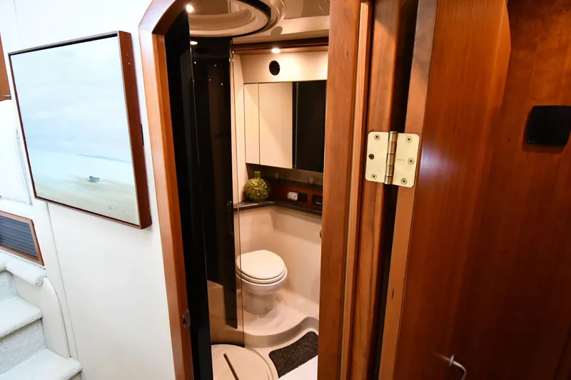 Slide: The Image of Luxurious bathroom interior of 2007 Cruisers Yachts 455 Express Motoryacht, featuring modern amenities. - 38