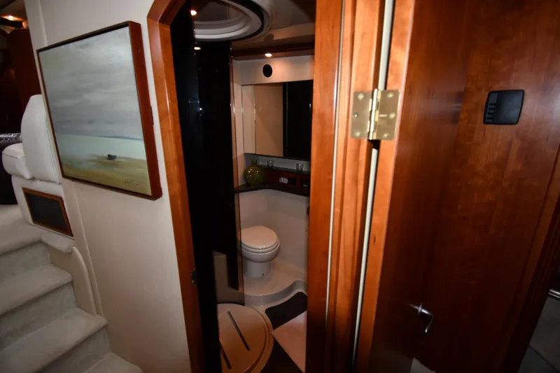Slide: The Image of Luxurious bathroom interior of 2007 Cruisers Yachts 455 Express Motoryacht with wood accents. - 39