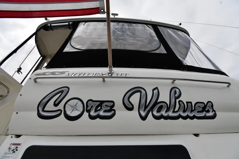 Slide: The Image of 2007 Cruisers Yachts 455 Express Motoryacht with "Core Values" name on stern. - 4