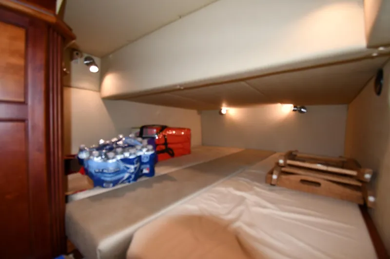 Slide: The Image of 2007 Cruisers Yachts 455 Express Motoryacht interior storage area with supplies. - 43