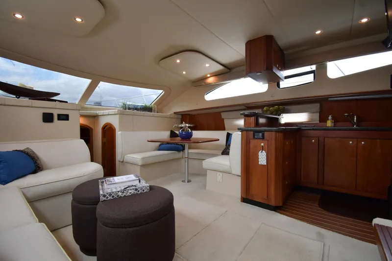 Slide: The Image of Luxurious interior of 2007 Cruisers Yachts 455 Express Motoryacht with elegant seating and kitchen area. - 44