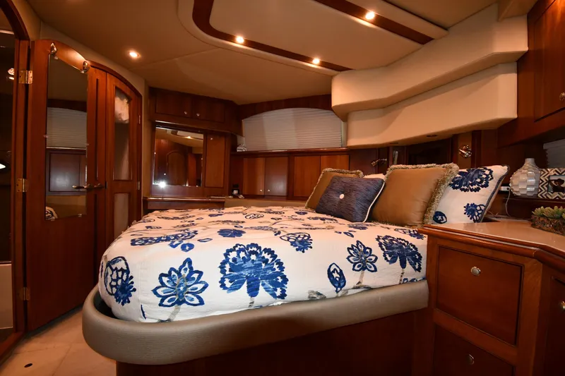 Slide: The Image of Luxurious bedroom interior of 2007 Cruisers Yachts 455 Express Motoryacht with elegant wood finishes. - 57