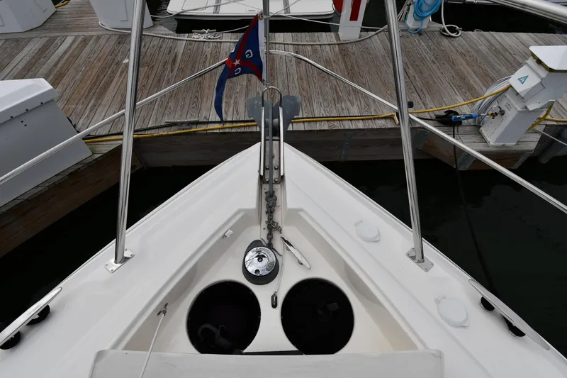 Slide: The Image of Bow view of 2007 Cruisers Yachts 455 Express Motoryacht docked at marina. - 7