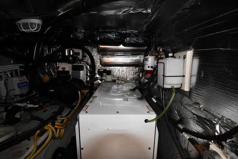 Slide: The Image of Engine room of 2007 Cruisers Yachts 455 Express Motoryacht with mechanical components. - 71