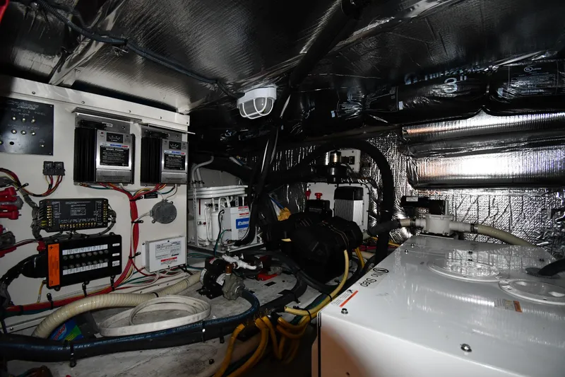 Slide: The Image of Engine room of 2007 Cruisers Yachts 455 Express Motoryacht with wiring and equipment. - 72