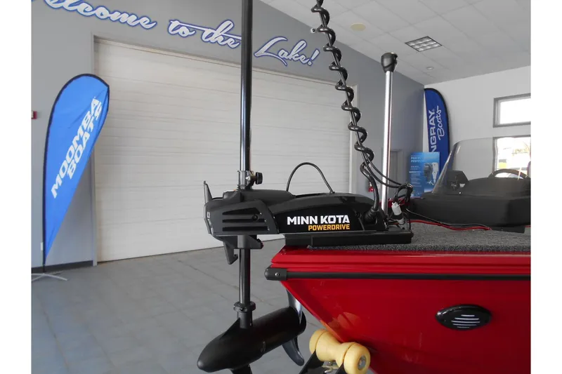 Slide: The Image of 2025 Crestliner 1650 Fish Hawk SC JS with Minn Kota PowerDrive motor in showroom. - 3
