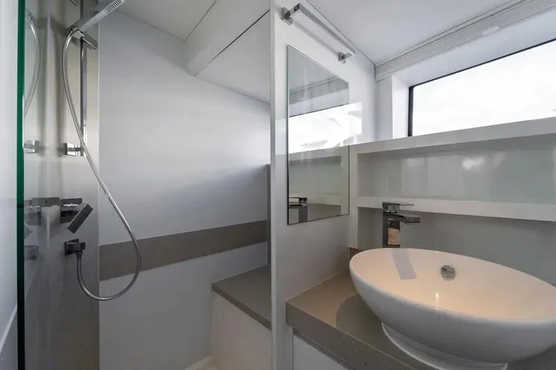 Slide: The Image of Modern bathroom in 2019 DutchCraft 56 Open yacht with sleek sink and shower. - 29