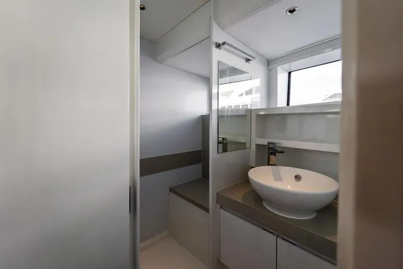 Slide: The Image of Modern bathroom interior on 2019 DutchCraft 56 Open yacht, featuring sleek design and round basin. - 30
