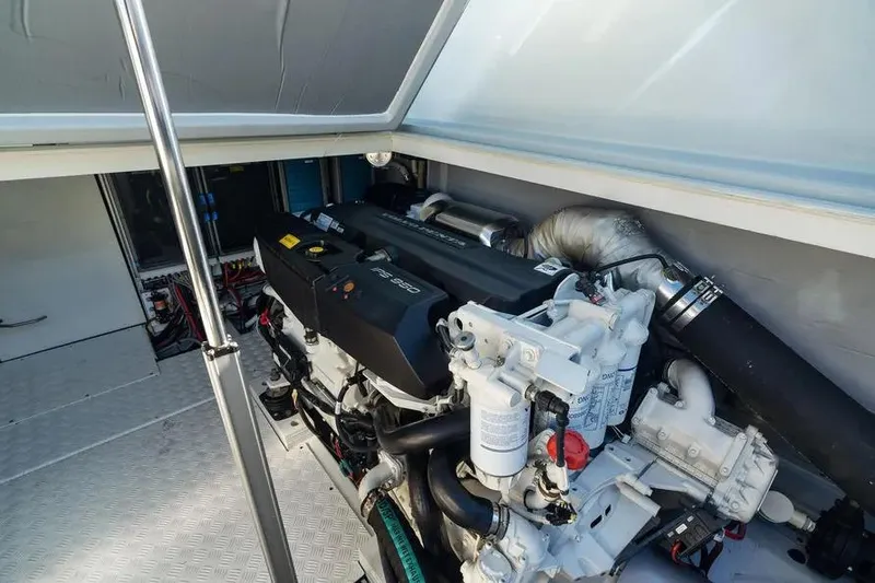 Slide: The Image of Engine room of 2019 DutchCraft 56 Open yacht, showcasing advanced marine engine components. - 40