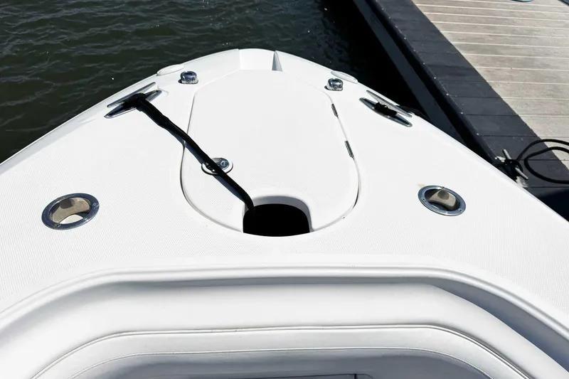 Slide: The Image of Bow of 2005 Wellcraft 32 CCF boat docked at marina. - 12