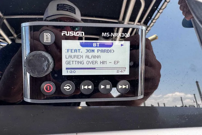 Slide: The Image of Fusion MS-NRX300 stereo on 2005 Wellcraft 32 CCF boat, playing "Getting Over Him" by Lauren Alaina. - 36