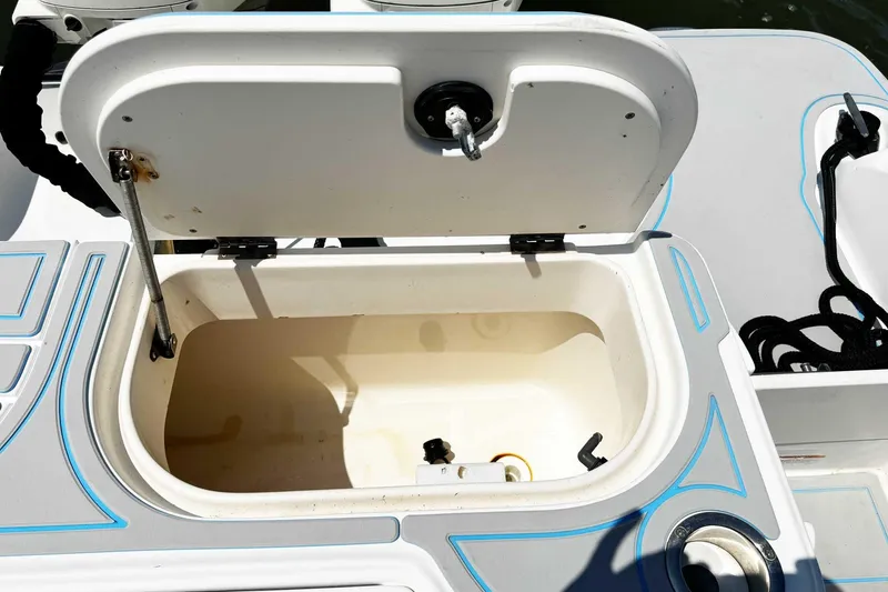 Slide: The Image of Open storage compartment on 2005 Wellcraft 32 CCF boat deck. - 44