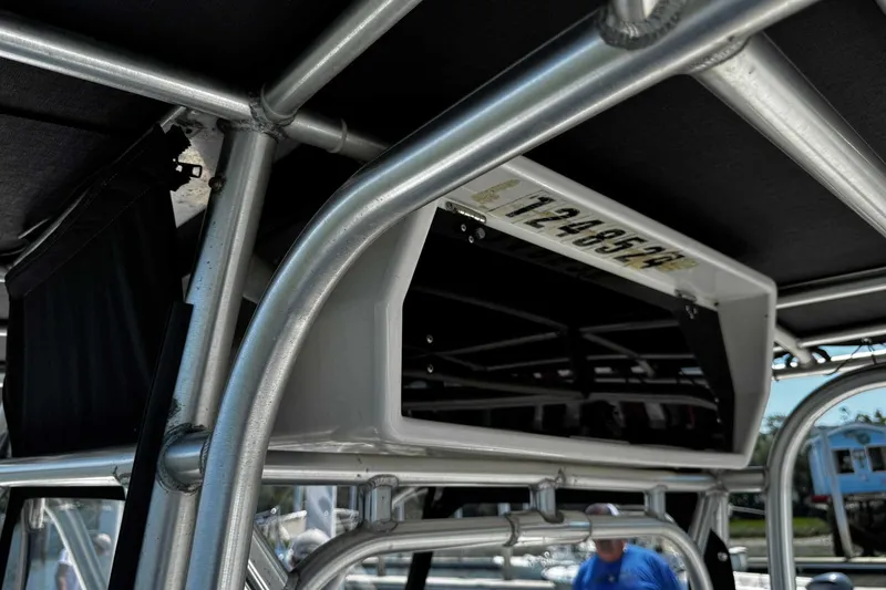 Slide: The Image of Close-up of 2005 Wellcraft 32 CCF boat's metal framework and storage compartment. - 54