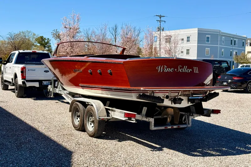Slide: The Image of 2026 Verano V25 boat "Wine Seller III" on trailer, parked outdoors. - 6