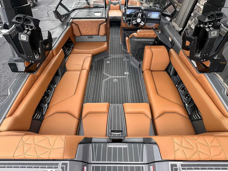 Slide: The Image of Interior of 2023 Nautique Super Air Nautique G23 Paragon with luxurious leather seating. - 12
