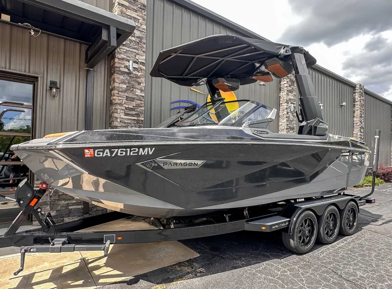 Slide: The Image of 2023 Nautique Super Air Nautique G23 Paragon on trailer outside building. - 4