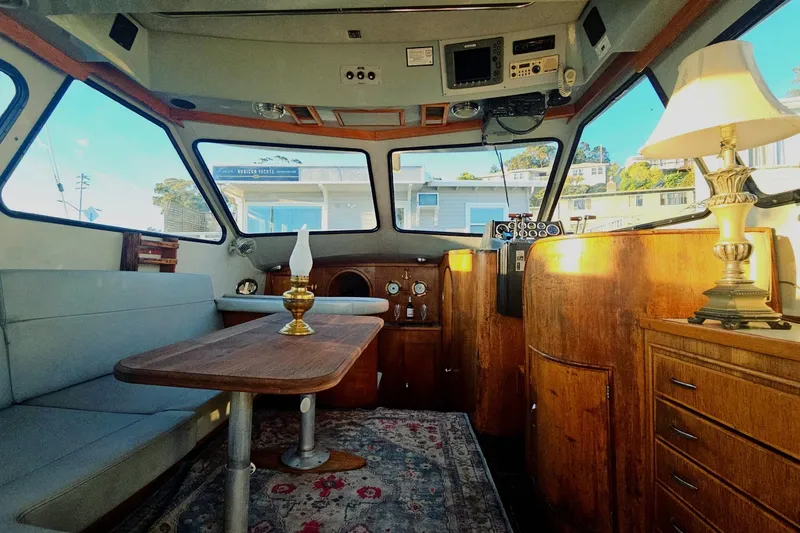 Slide: The Image of Interior of 1989 Mediterranean 38 Express yacht with wood accents and elegant decor. - 14