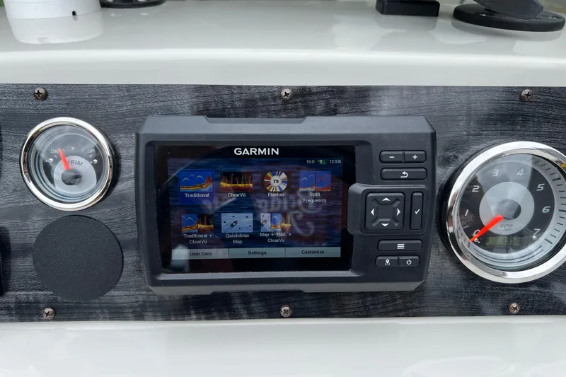Slide: The Image of Dashboard of 2021 Tahoe Pontoon GT Center Console Fish 25' with Garmin display. - 10
