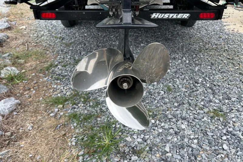Slide: The Image of Propeller of 2021 Tahoe Pontoon GT Center Console Fish 25' on gravel surface. - 5