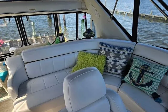 Slide: The Image of Radar and satellite equipment on 2003 Carver 444 Cockpit Motor Yacht against cloudy sky. - 10