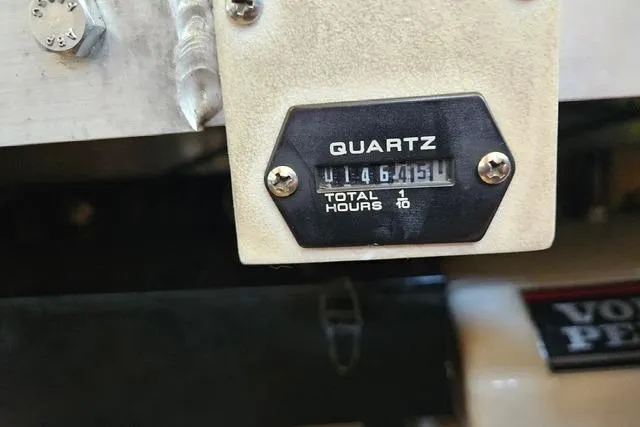 Slide: The Image of Hour meter on 2003 Carver 444 Cockpit Motor Yacht, showing 1464.1 hours. - 45