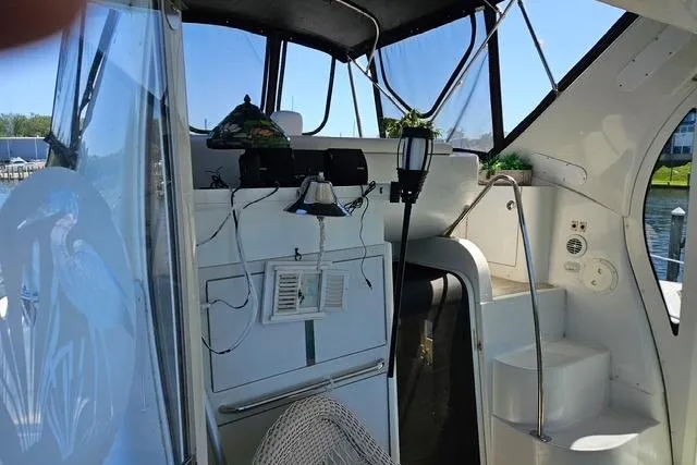 Slide: The Image of Control panel of 2003 Carver 444 Cockpit Motor Yacht with Raymarine navigation equipment. - 9