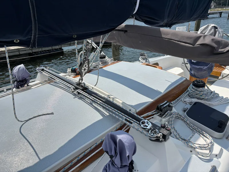 Slide: The Image of Sailboat deck of 1992 Catalina 34 with rigging and covered equipment. - 19
